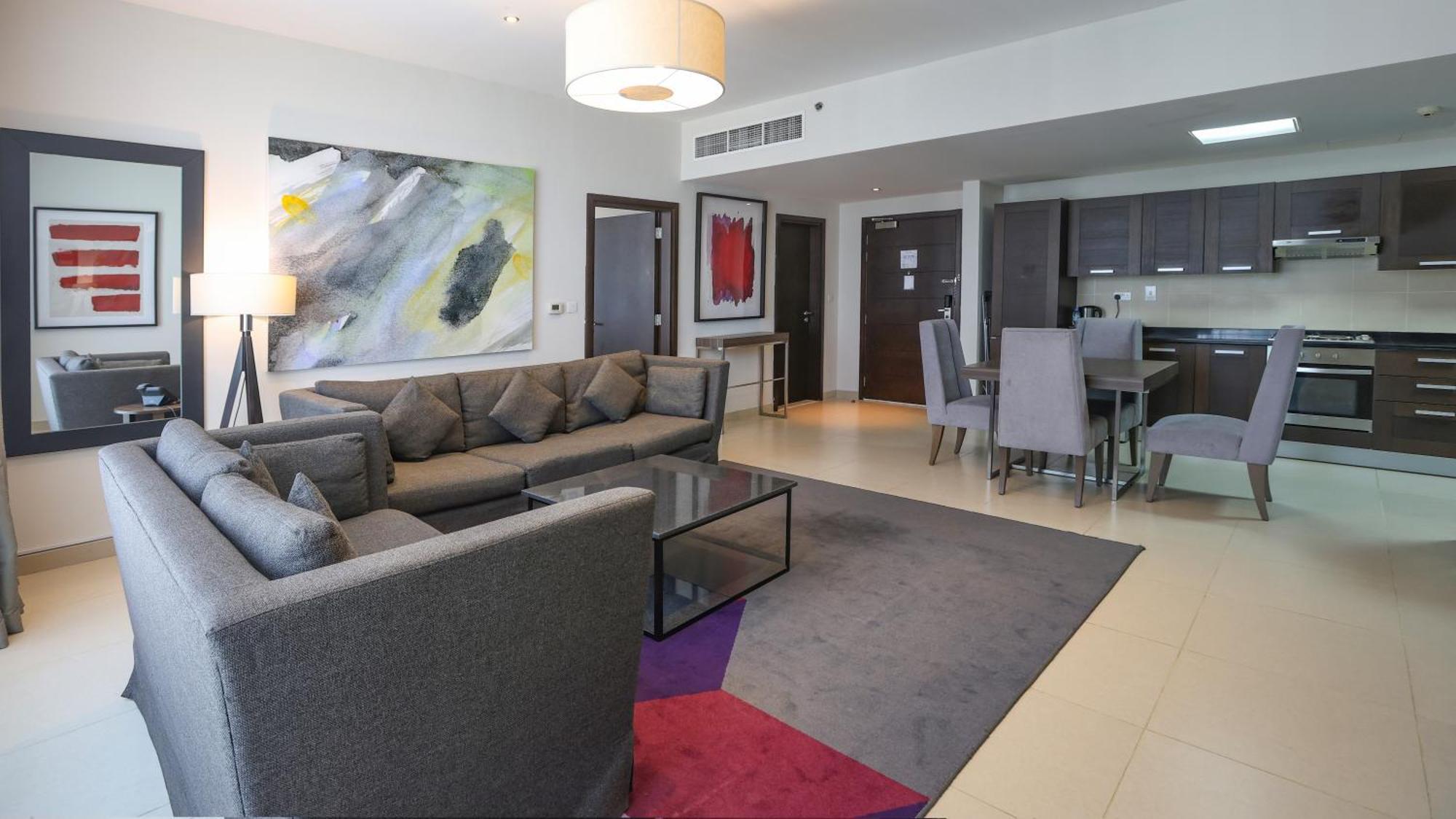 Nassima Tower Hotel apartamentos Dubái Exterior foto A living room in a typical apartment