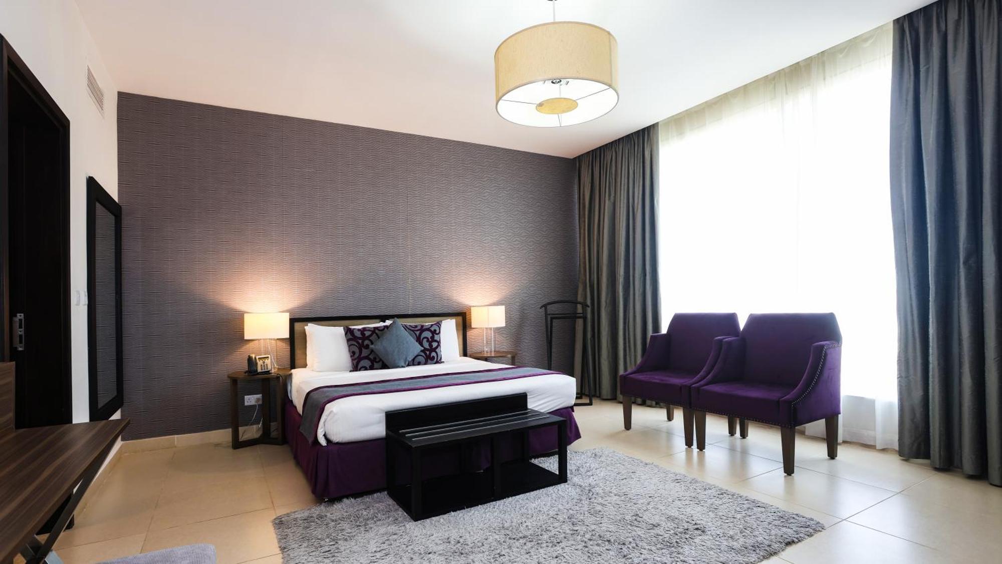 Nassima Tower Hotel apartamentos Dubái Exterior foto A bedroom at the hotel